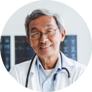 Portrait of a male doctor with radiography in the background.